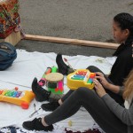 FAIR School Students Anna Berger and Madeline Chamberlain making music for passers-by at the intersection of Hennepin Ave and Spruce Place.